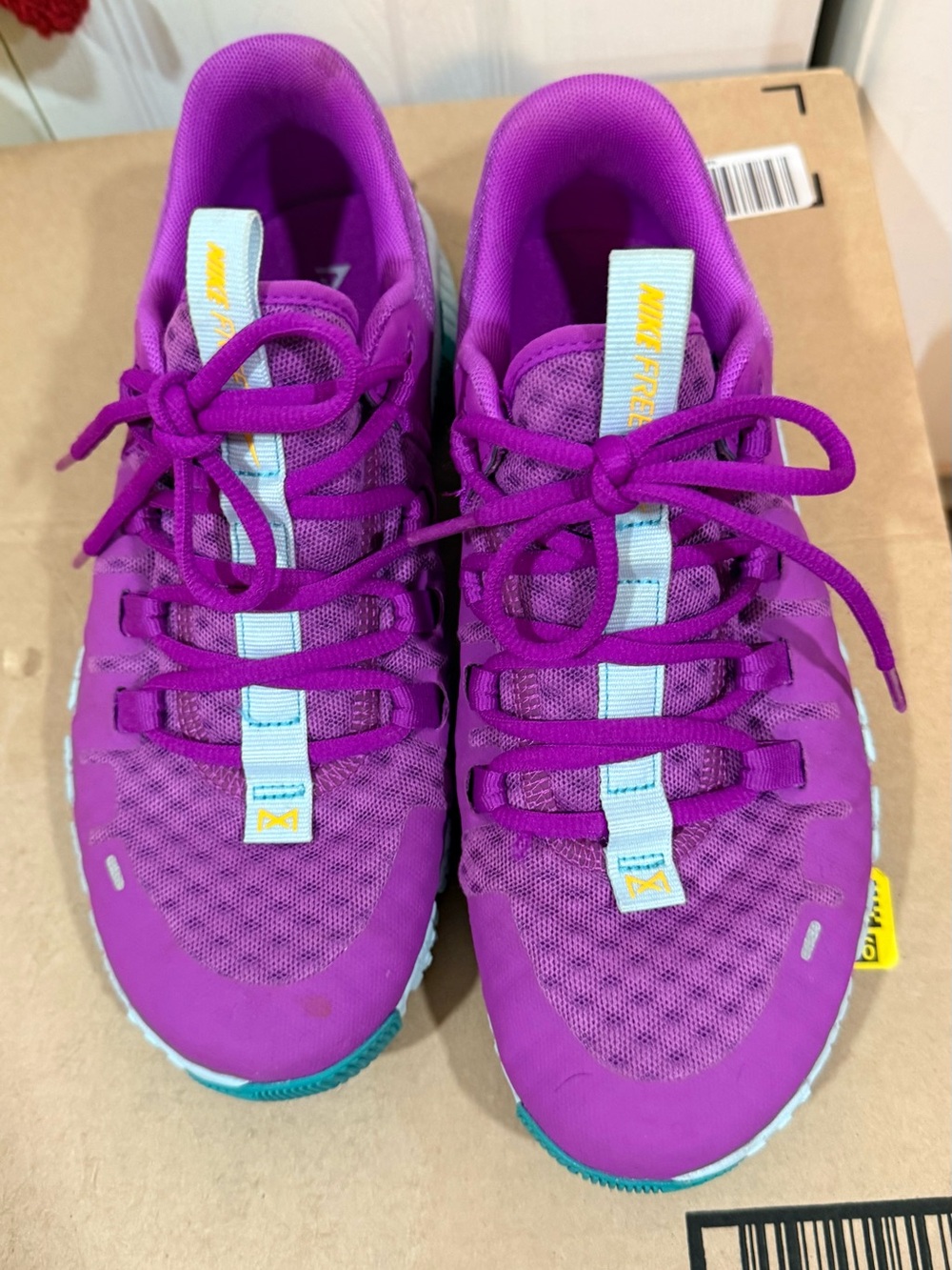 Nike Women's Purple Athletic Sneakers with Aqua Tongue Accents